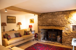 Ground floor:  Cosy sitting room with inglenook fireplace, bread oven and wood burning stove