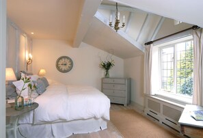 Ground Floor: Bedroom one downstairs, with en-suite shower room and super-king size bed