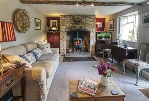 Ground floor:  Sitting/dining room with wood burning stove