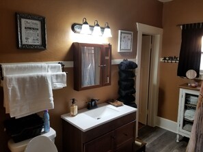 Bathroom, restored in 2018, new floors and claw foot tub for hot bubble baths!