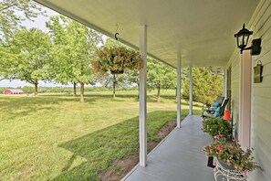 Sip iced tea and enjoy sunset views from the charming front porch.