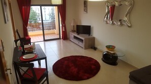 spacious living room with corner sofa double bed