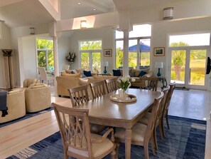 The open floor plan in the dining room and great room have vaulted ceilings with lots of natural light.