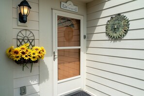 Leave your worries outside and open the door to vacation vibes!