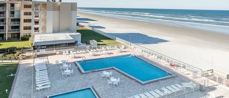 Oceanfront Pool Area at New Smyrna Beach Condo Rental