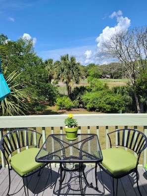 A welcoming front porch is the perfect spot to enjoy your morning cup of coffee.