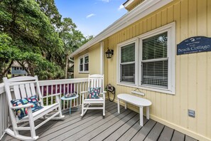 The front porch is the perfect spot for morning coffee or a glass of wine.