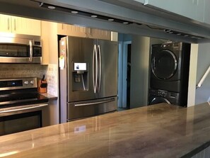 The newly remodeled kitchen is open to the great room.