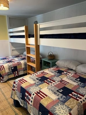 Built in bunk beds are in the 1st bedroom upon entry.