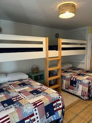 1st bedroom upon entry now has built in bunk beds with full beds on bottom, twin over top.