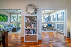 The sunroom has been cleverly divided for reading and relaxing!