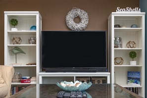 Gather around the HDTV w/DVD to watch your favorite shows or movies.