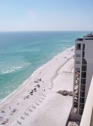 View of the beach from balcony looking west