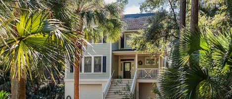 Welcome to this Charleston-style home with great views of Mallard Lake.