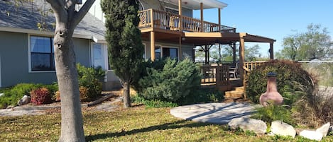 Back decks looking out onto lake. Perfect spot to have a glass of wine!