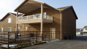 Beautiful deck with dog run underneath.