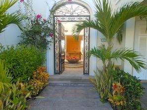 Villa entry gates and  courtyard