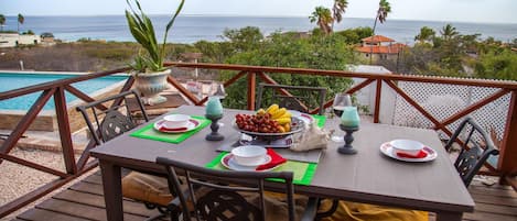 Private & scenic outdoor romantic dining overlooking the pool and the Ocean. 