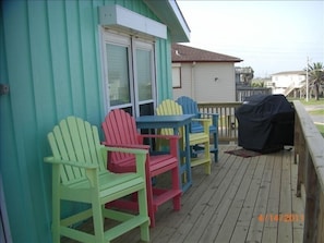 Deck with awsome views of the beach from your Life Guard Chairs with BBQ pit.