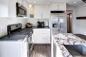 Fully stocked kitchen.