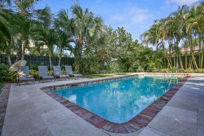 Large heated pool and lounge chairs for sunning!
