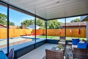 Enjoy the screened-in patio and decide what to do for the day.