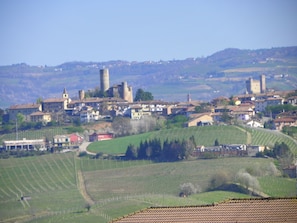 The castel of Serralunga on the right. Castiglione 
Falletto on the left