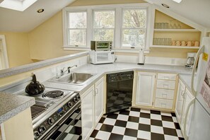 The well-stocked kitchen complete with ocean views