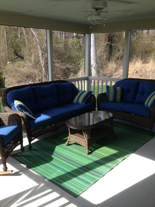 Enjoy sitting on the porch watching tv or enjoying the tranquil surroundings