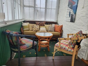 Front porch opening into dining room