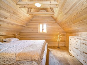 Bedroom, Room, Property, Attic, Bed, Furniture, Interior Design, Building, Ceiling, Wood