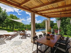 Furniture, Chair, Outdoor Furniture, Wood, Table, Kitchen & Dining Room Table, Outdoor Table, Shade, Flooring, Porch