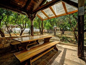 Table, Plant, Wood, Shade, Outdoor Bench, Tree, Outdoor Furniture, Interior Design, Picnic Table, Landscape