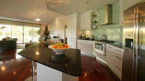 Clean slick kitchen - fully equipped with everything - just BYO food/drinks