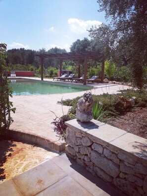 shaded pool pergola