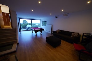 Games room with pool table and home cinema