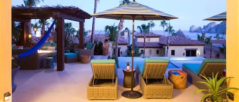 Terrace with pool side lounges w/views to ocean and sea of cortez