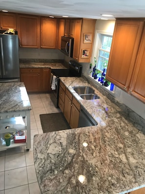Brand new granite countertops & stainless appliances