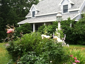 Front of the House with Foliage, Gardens & Farmer's Porch