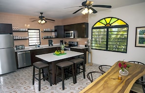 Dining table and kitchen