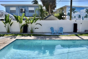 Little beach area with chairs to relax while swimming