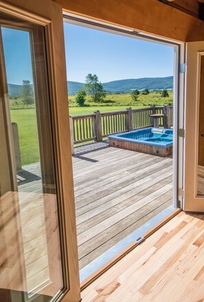 french doors open to the rear deck, hot tub and Canaan Valley Wildlife Refuge