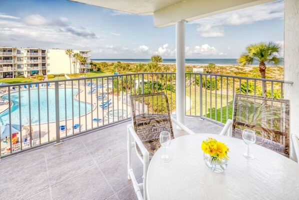 Patio - Ocean view patio features a table with seating for six and an electric grill for outdoor barbequing. Perfect spot to relax and unwind!