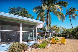 The Ibis cottage side view of lanai.