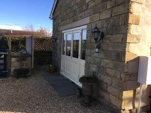 The French doors can be opened when the weather is warm 