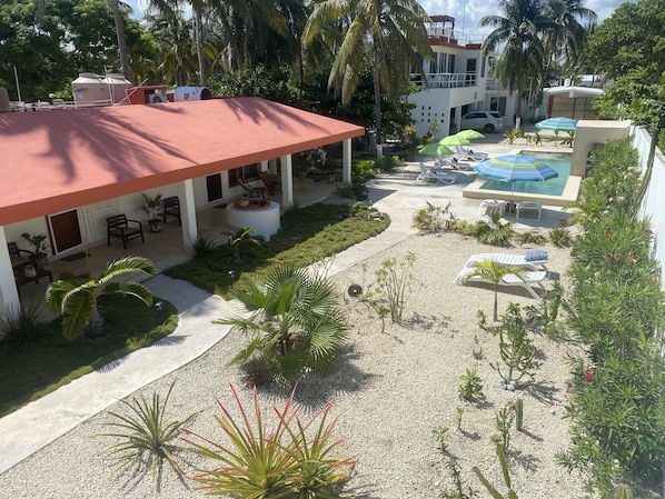 View of the courtyard garden and pool. BRISA is in the courtyard casita