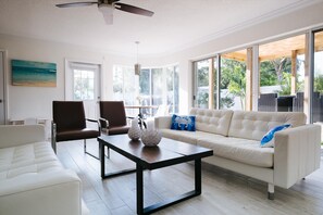 Bright and spacious pool area located by pool area and patio.