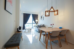 Dining Area equippe with full dining table and chairs. Perfect for family-size.