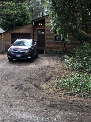 The house is set back from the street, parking for two cars.  CRV not included.