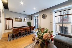 Living room & dining table with 2 balconies- view from the left- Plaza Tirso 